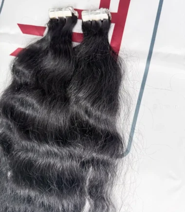 Shop Jet Black Tape-In Wavy Extensions Shop Jet Black Tape-In Wavy Extensions