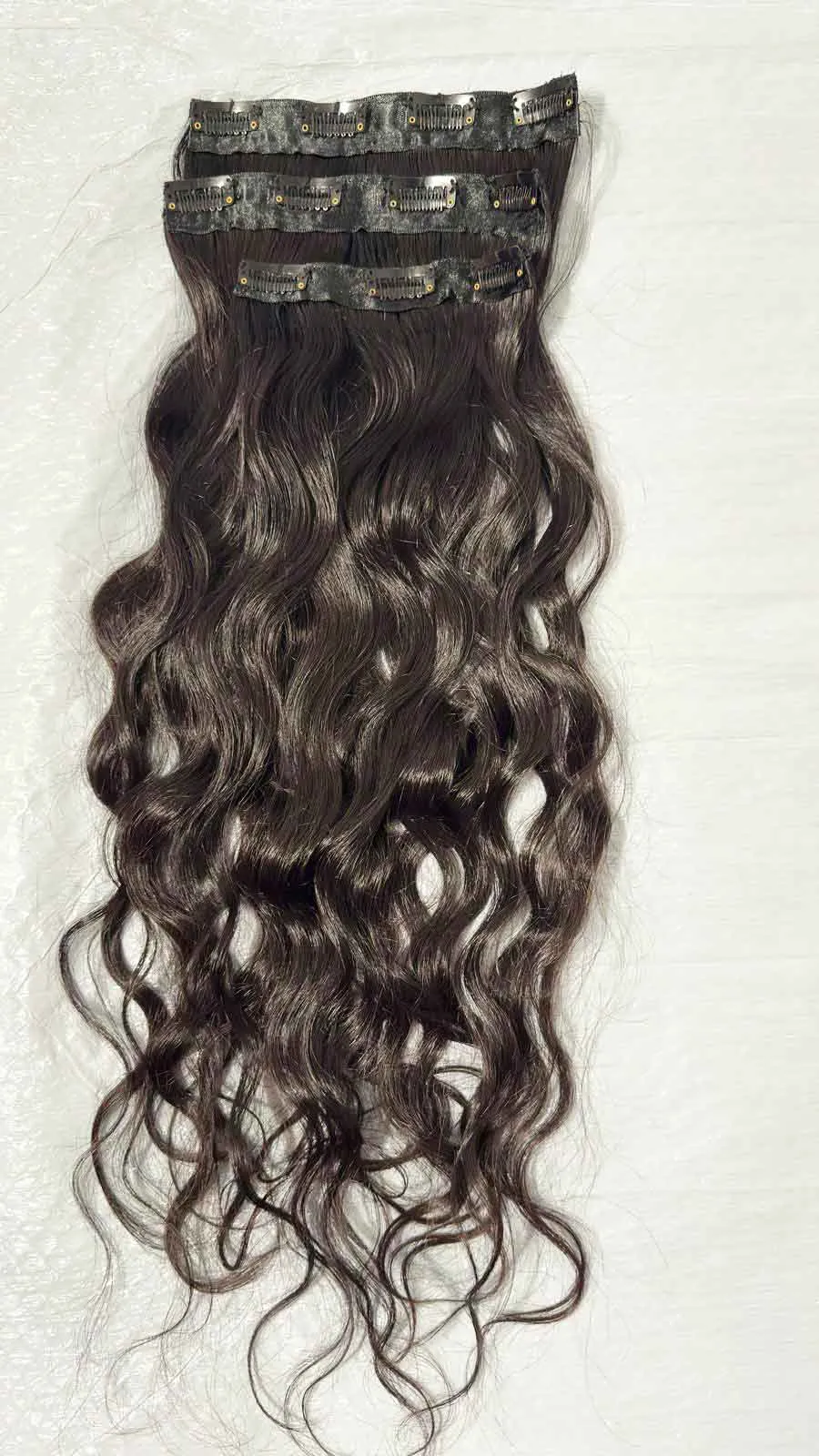 black-wavy-clip-in-hair-extensions-3-piece-11-clip-texas Three-piece natural black wavy clip-in hair extensions