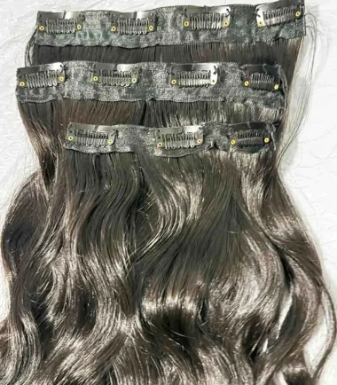black-wavy-clip-in-hair-extensions-3-piece Two four-clip wefts and one three-clip natural black weft