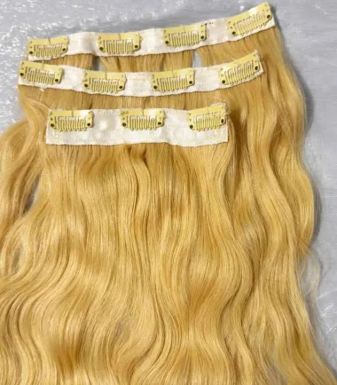 Blonde human-hair clip-in set with eleven clips