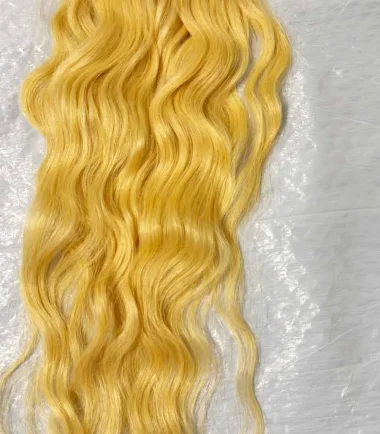 blonde-wavy-clip-in-hair-extensions-5-piece One three-clip, two two-clip, and two one-clip hair wefts