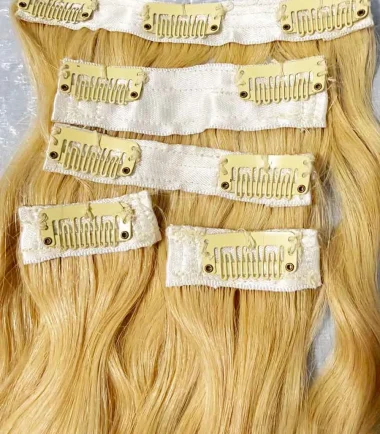 blonde-wavy-clip-in-hair-extensions-5-piece-9-clip-usa Blonde human-hair clip-in set with nine clips