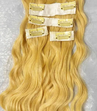 Five-piece blonde wavy clip-in hair extensions