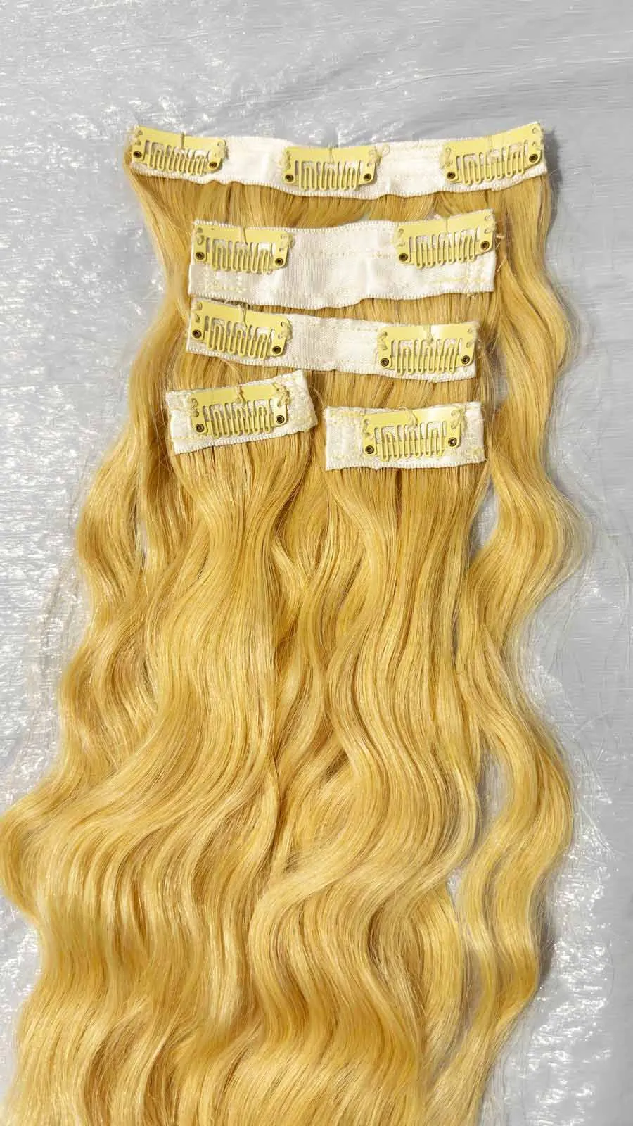 blonde-wavy-clip-in-hair-extensions-5-piece-9-clip-usa-stock Five-piece blonde wavy clip-in hair extensions