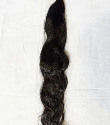 Natural black wavy clip-in hair extensions with seven clips